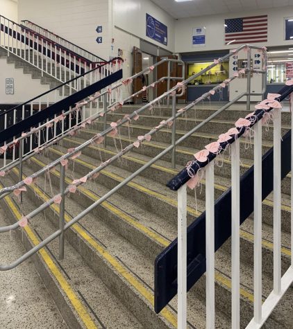 The main stairwell of the commons, adorned with paper hearts