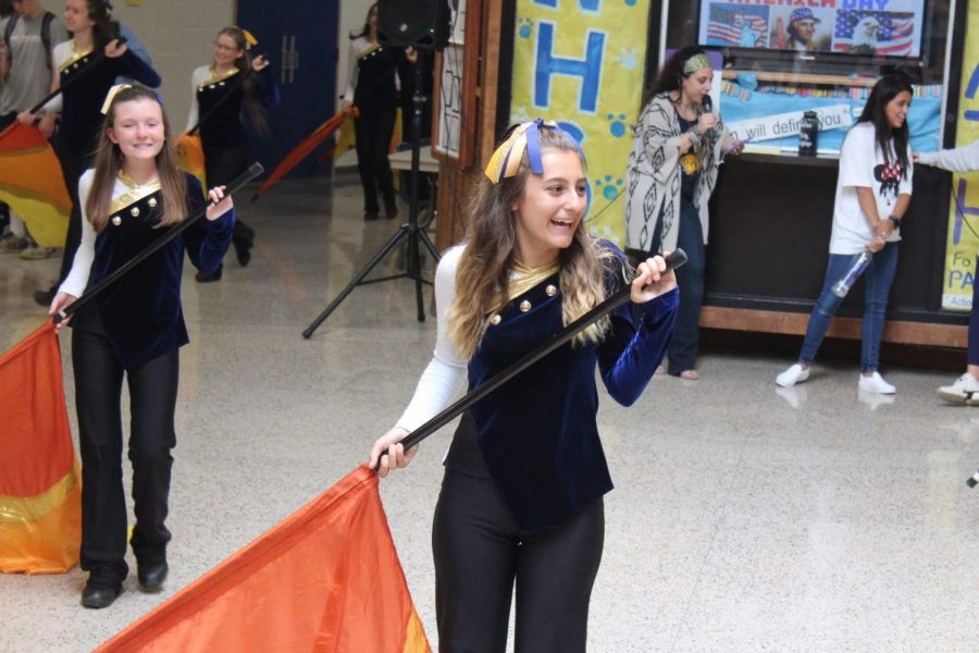 Senior Bella DeStio performs with the Northport Flagline during the 2019 Homecoming Commons Show