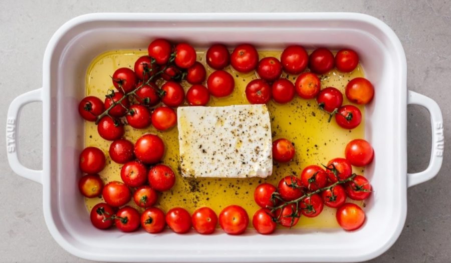 The recipe for TikTok Pasta calls for baked feta and tomatoes to be mixed with pasta.