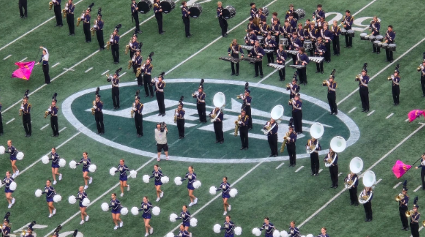 The band’s performance at the Jets opening game.